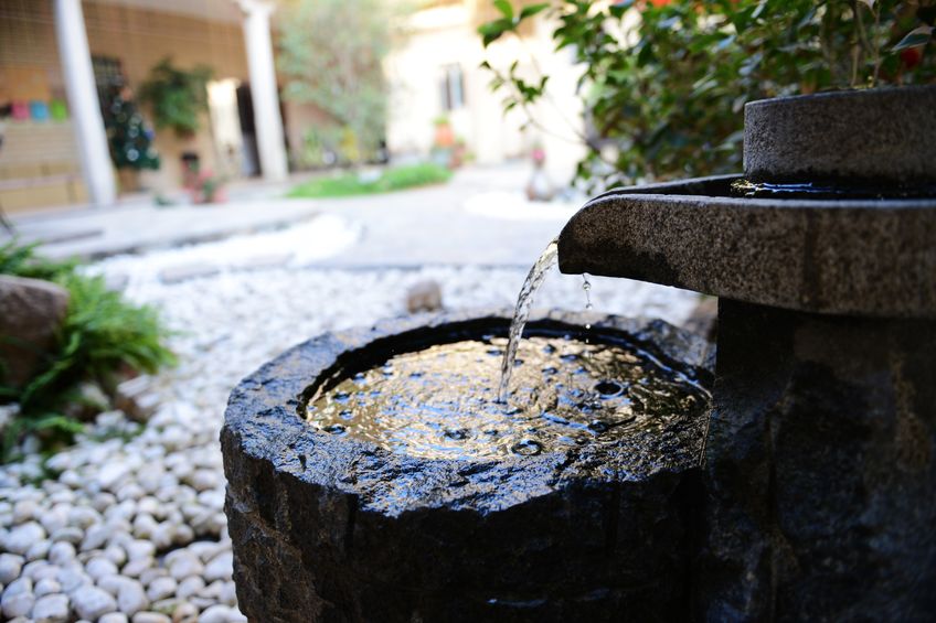 outdoor water fountain on sheltered patio